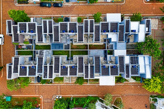 Drone shot of an organized residential area in Banten, Indonesia with solar panels.